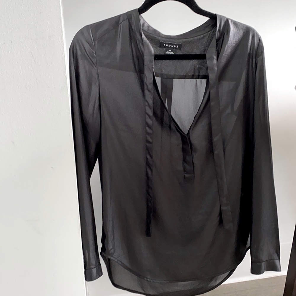 Never worn top - has a silky/leathery look to it